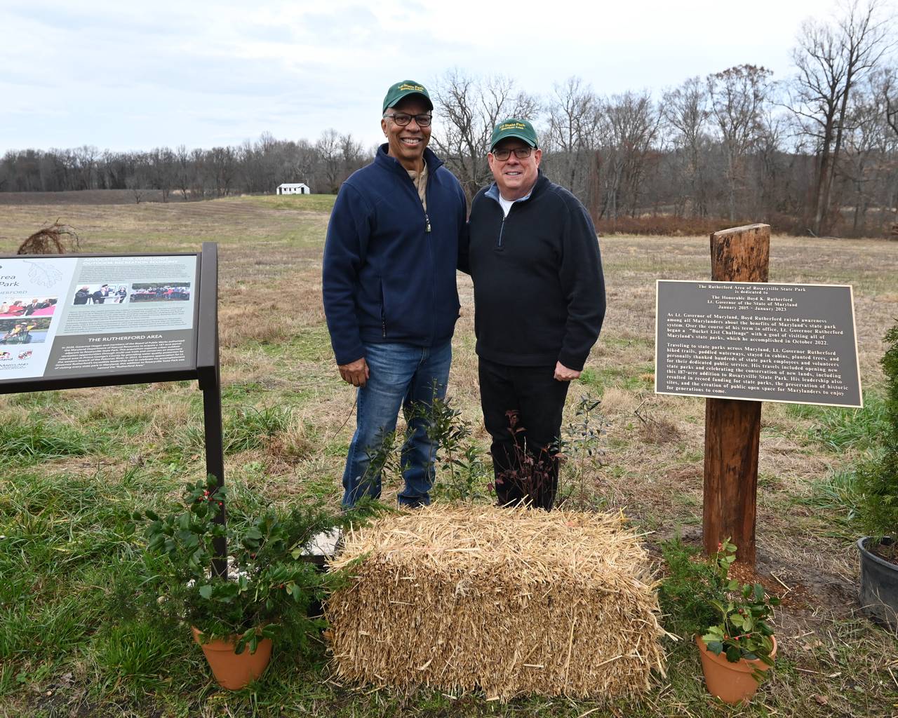 Lt. Gov. Boyd Rutherford, left, and Gov. Larry Hogan pose for pictures at the newly designated "Rutherford Area" of Rosaryville State Park in Prince George's County on Dec. 8, 2022.