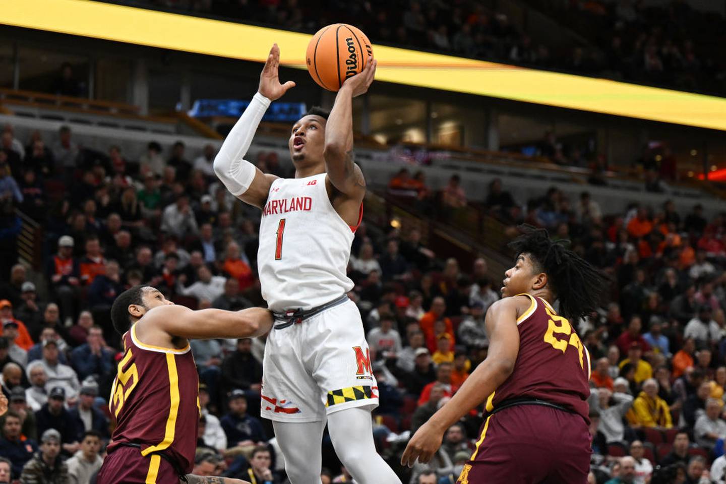 CHICAGO, ILLINOIS - MARCH 09: Jahmir Young #1 of the Maryland Terrapins shoots in the first half against Ta'lon Cooper #55 of the Minnesota Golden Gophers at United Center on March 09, 2023 in Chicago, Illinois.