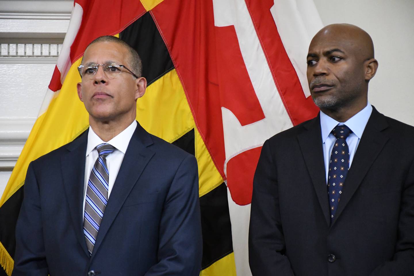 Maryland Attorney General Anthony Brown, left, and U.S. Attorney for Maryland Erek Barron listen during a press conference at the State House in Annapolis on Thursday, Jan. 19, 2023.+