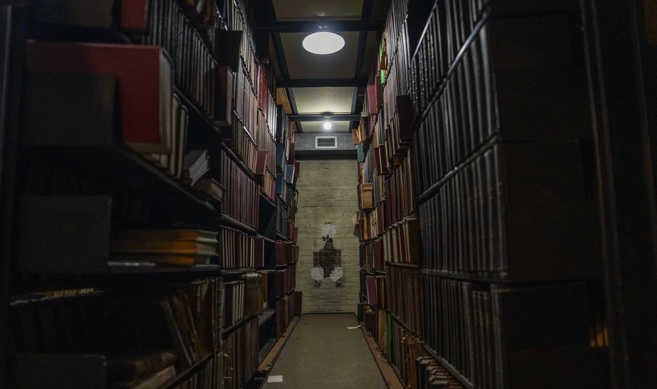 The library stacks at the Maryland State Medical Society are extensive, going up multiple levels and floors. The books date back to the 18th century. Here they are pictured  on August 2, 2023.