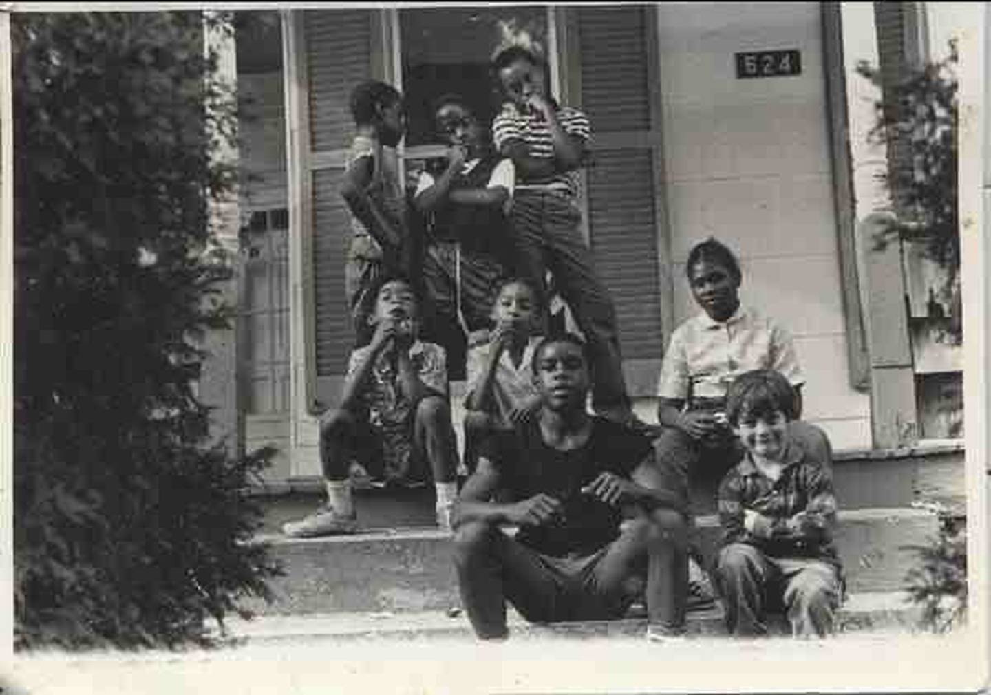 Sam Brand with a few neighborhood kids. He grew up in Baltimore, splitting time between the East and the South.