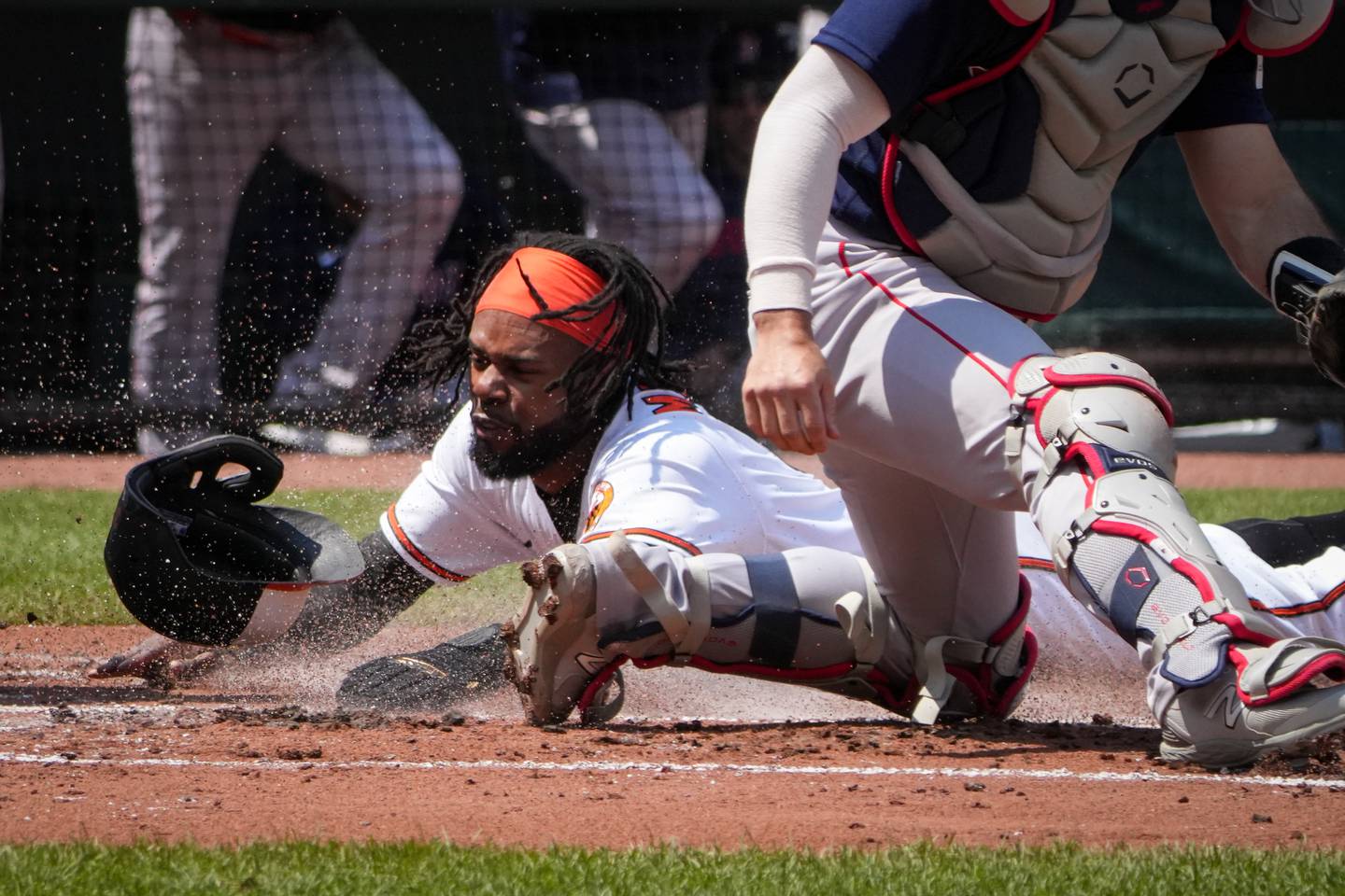 Baltimore Orioles outfielder Cedric Mullins (31) slides to home plate safely in a baseball game against the Boston Red Sox at Camden Yards on Wednesday, April 26. The Orioles played the Red Sox in the third game of the series, with the winner of Wednesday's game taking the series.
