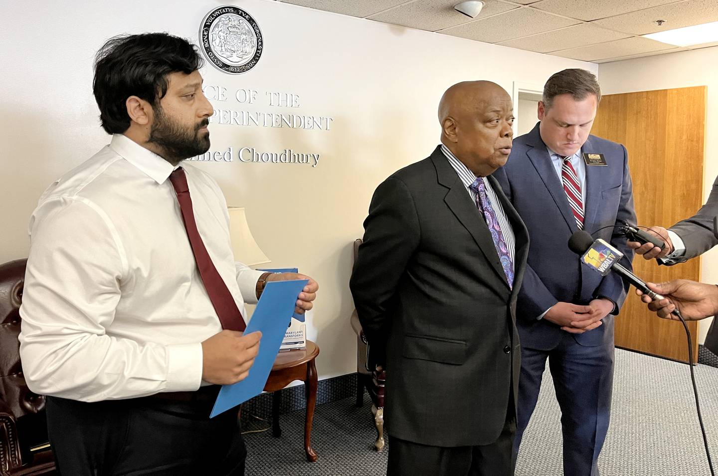 Maryland State Superintendent of Schools Mohammed Choudhury, state school board president Clarence Crawford and school board vice president Josh Michael at a press conference in August.