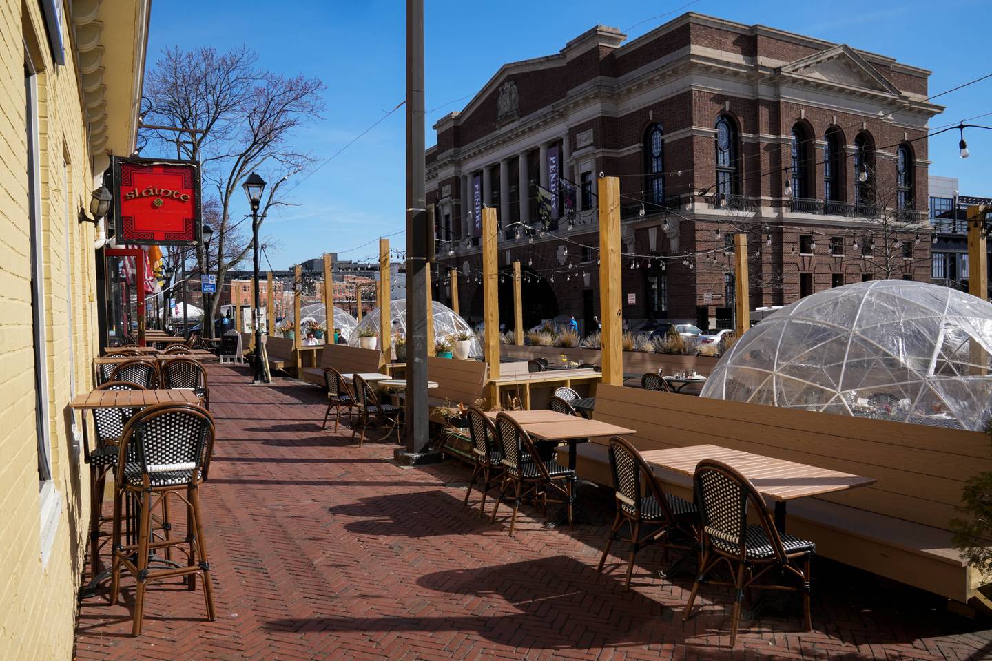 Restaurants like Sláinte along Fells Point’s waterfront have set up “parklets” for guests to enjoy outdoor dining.