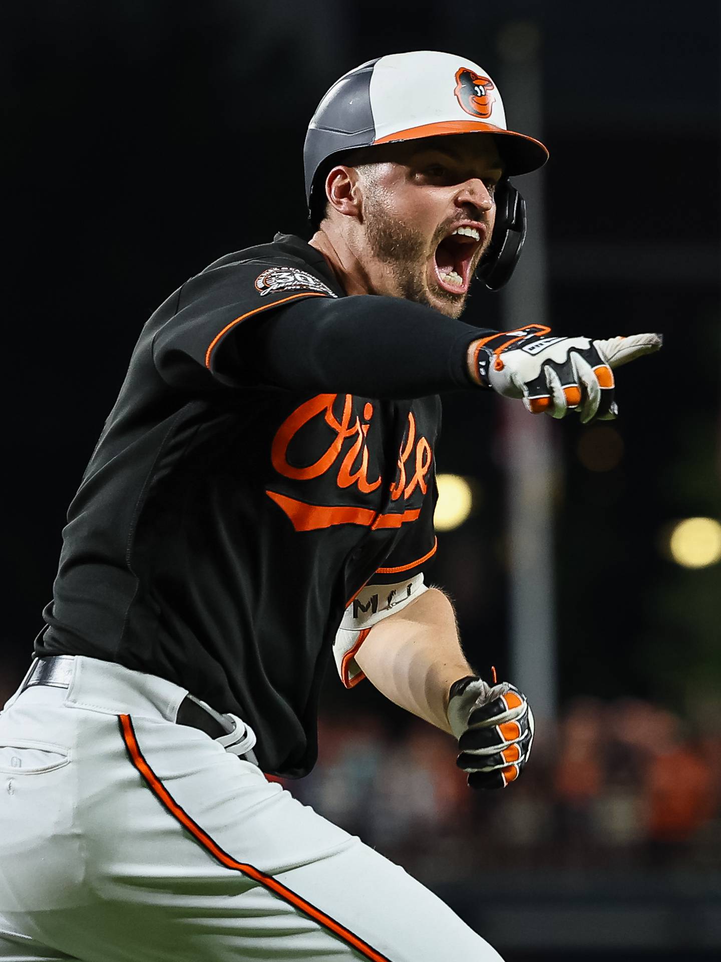 BALTIMORE, MD - JULY 08: Trey Mancini #16 of the Baltimore Orioles celebrates after hitting a walk off single against the Los Angeles Angels during the ninth inning at Oriole Park at Camden Yards on July 8, 2022 in Baltimore, Maryland. (Photo by Scott Taetsch/Getty Images)