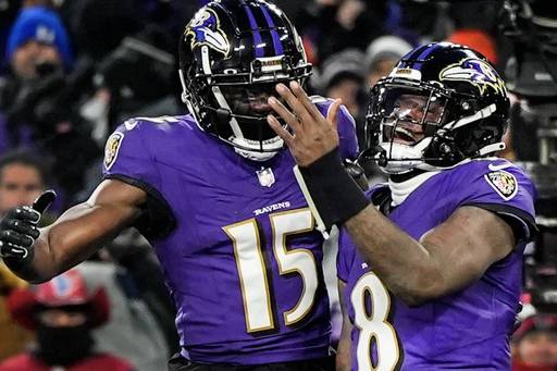 Baltimore Ravens #8 Lamar Jackson and #15 Nelson Agholor celebrate a TD in the second quarter.