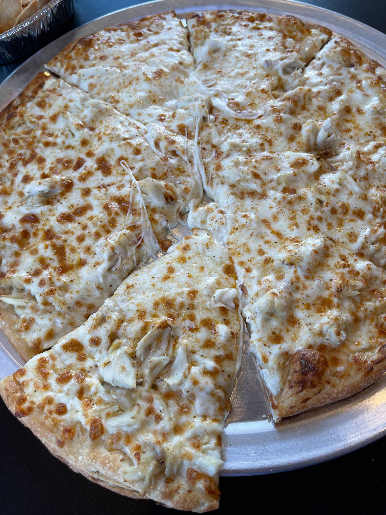 White crab pizza at Paulie’s NY Pizza & Ice Cream.