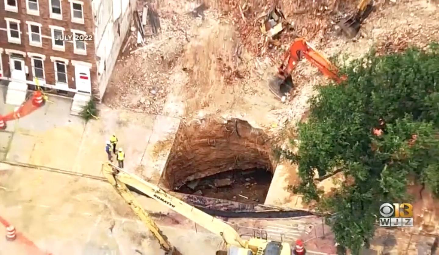 A still image from aerial footage filmed in July 2022 shows the scale of the sinkhole on North Avenue.