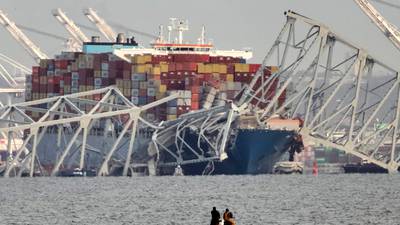 Dramatic photos show destruction of Francis Scott Key Bridge, damaged cargo ship