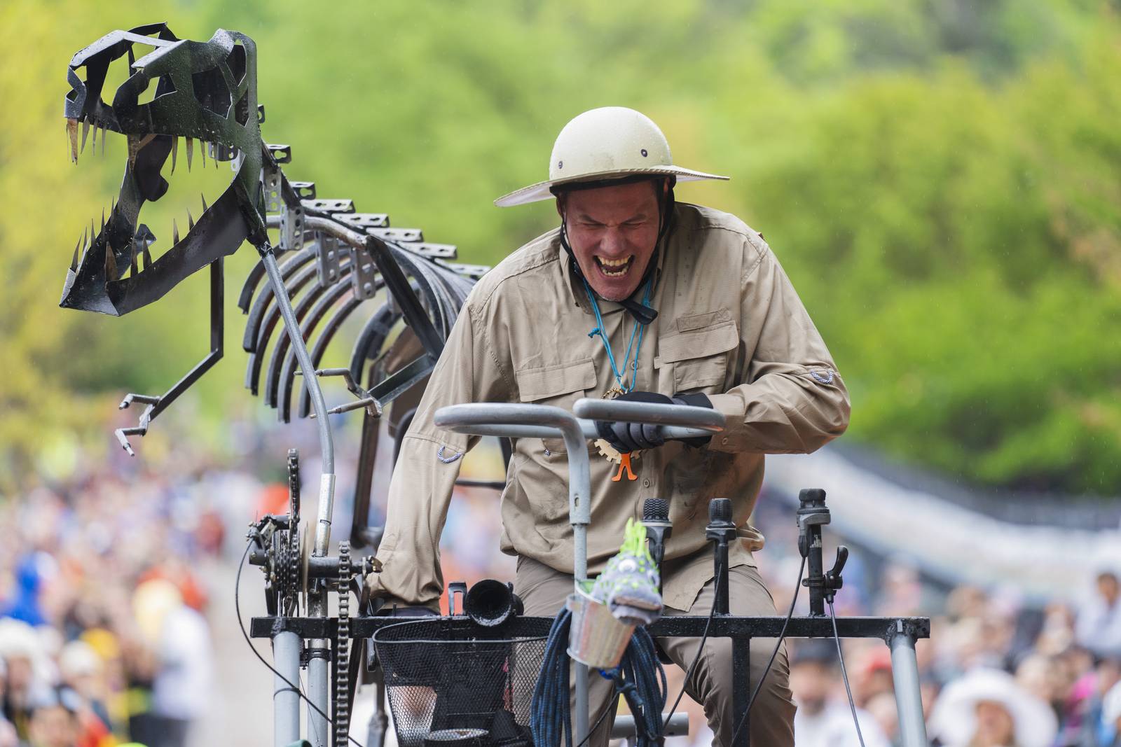 A cyclist makes it through the mud obstacle but not without effort during the Kinetic Sculpture Race hosted by the American Visionary Art Museum on May 4, 2024.