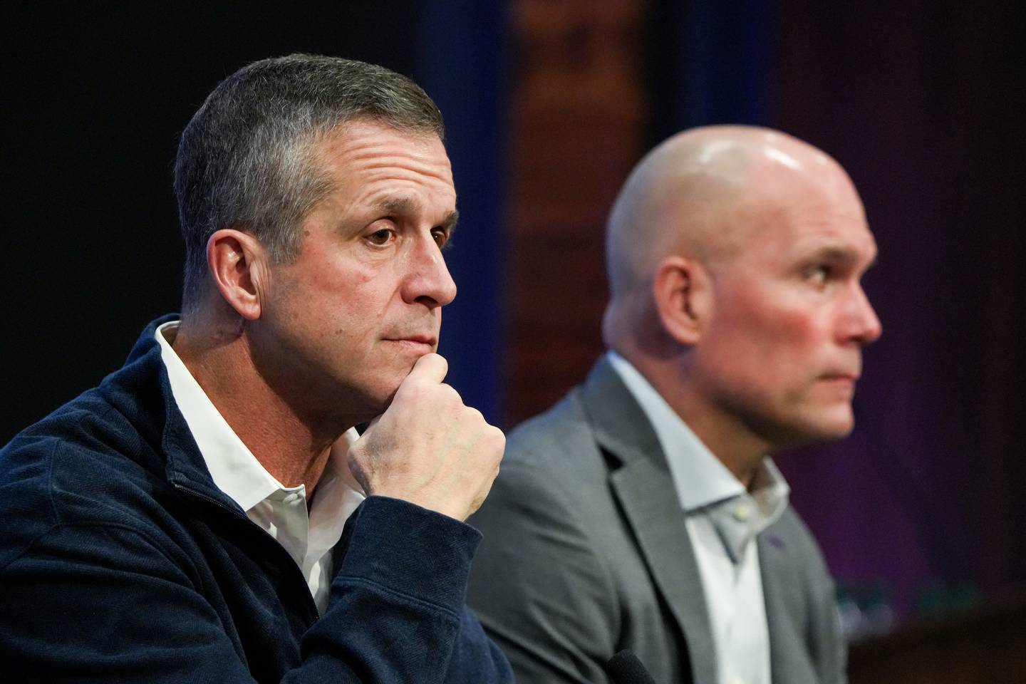 Baltimore Ravens head coach John Harbaugh, left, and General Manager Eric DeCosta take questions from reporters during the team's end of year news conference at the Under Armour Performance Center in Owings Mills on February 2, 2024.