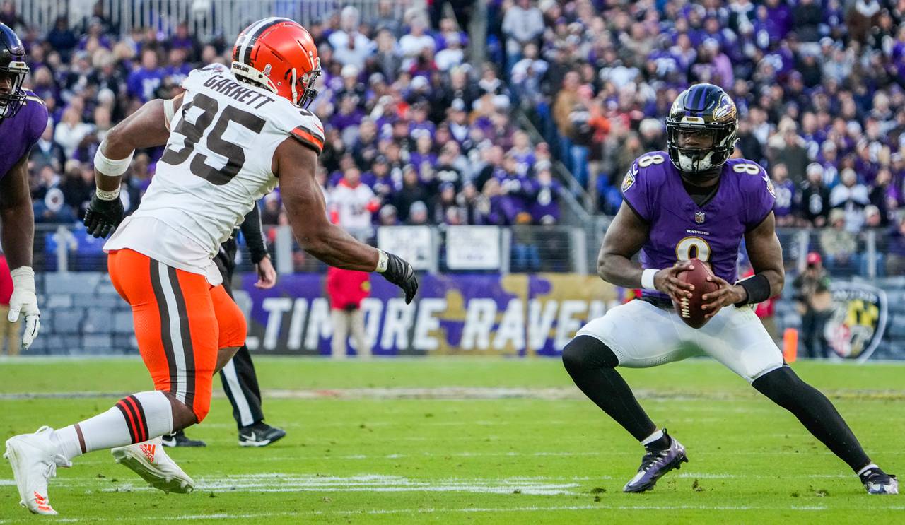 Baltimore Ravens quarterback Lamar Jackson (8) runs with the ball during the fourth quarter against the Cleveland Browns at M&T Bank Stadium on Sunday, Nov. 12, 2023.