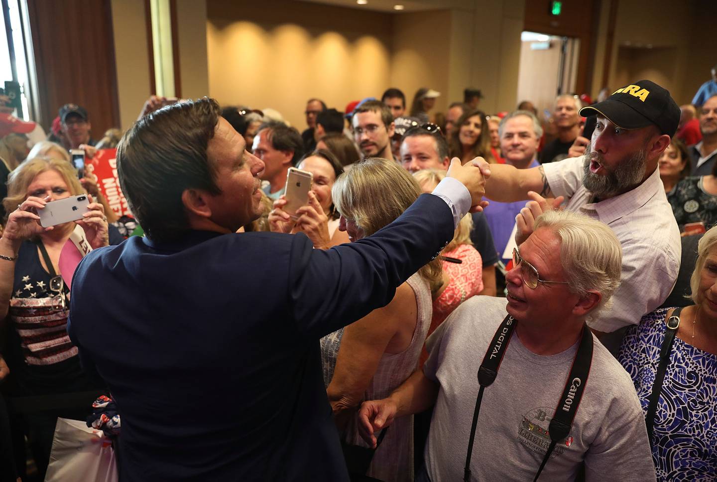 WEST PALM BEACH, FL - OCTOBER 06:  Republican gubernatorial candidate Ron DeSantis greets people as he holds a campaign rally at the Palm Beach County Convention Center on October 6, 2018 in West Palm Beach, Florida. DeSantis is facing off against Democratic challenger Andrew Gillum to be the next Florida governor.