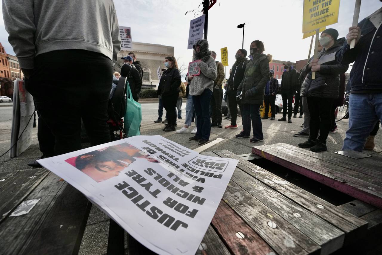 People gather at a protest hosted by the People’s Power Assembly for Tyre Nichols on the corner of North Avenue and North Charles Street on January 28, 2023.