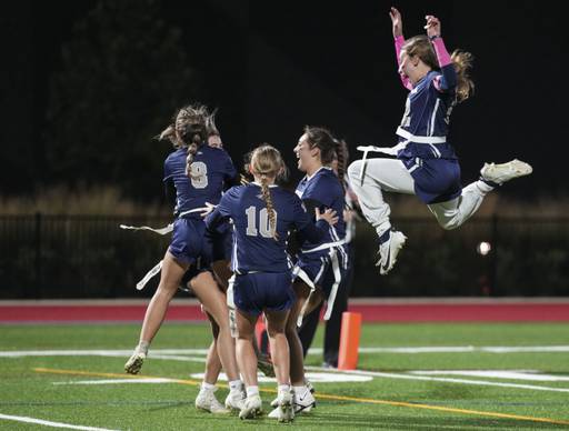 Urbana celebrates after scoring against Middletown during the Girls flag Championship at the Under Armour’s “The Stadium at the House” in Baltimore, Wednesday.