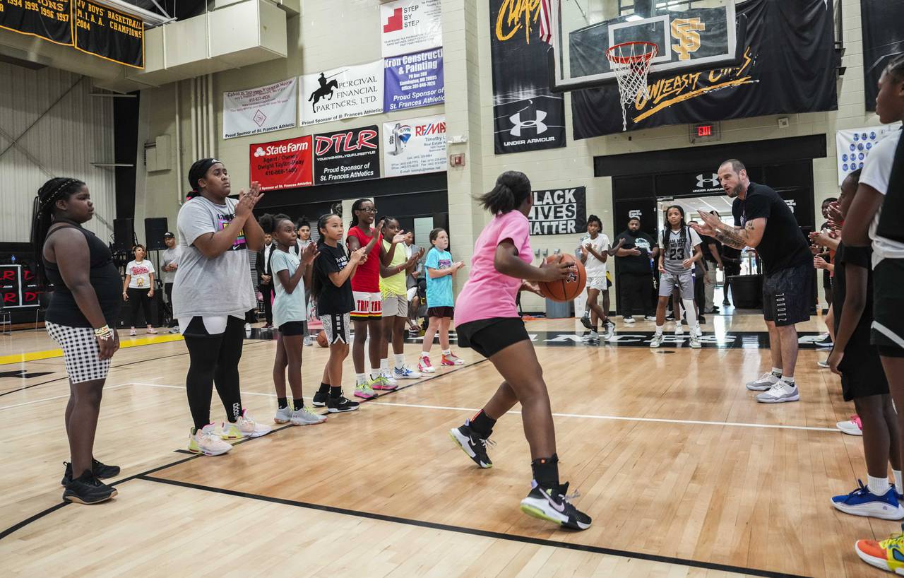 LSU basketball star and Baltimore native Angel Reese hosted a basketball clinic at Saint Frances Academy on July 19, 2023.