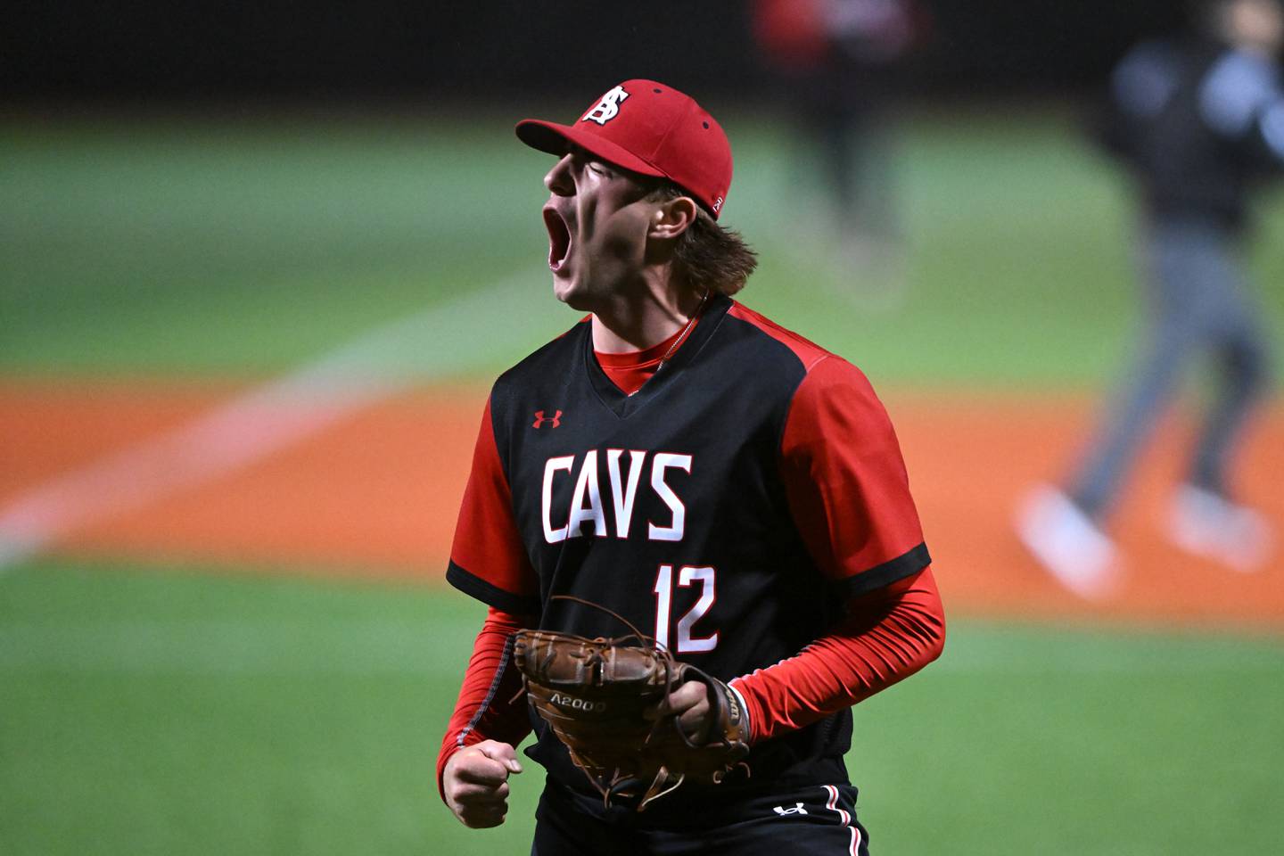 Martin Spalding pitcher Parker Thomas reacts after striking out a Clavert Hall batter with the bases loaded in a High School baseball game Friday, March 24, 2023 in Towson, Md.