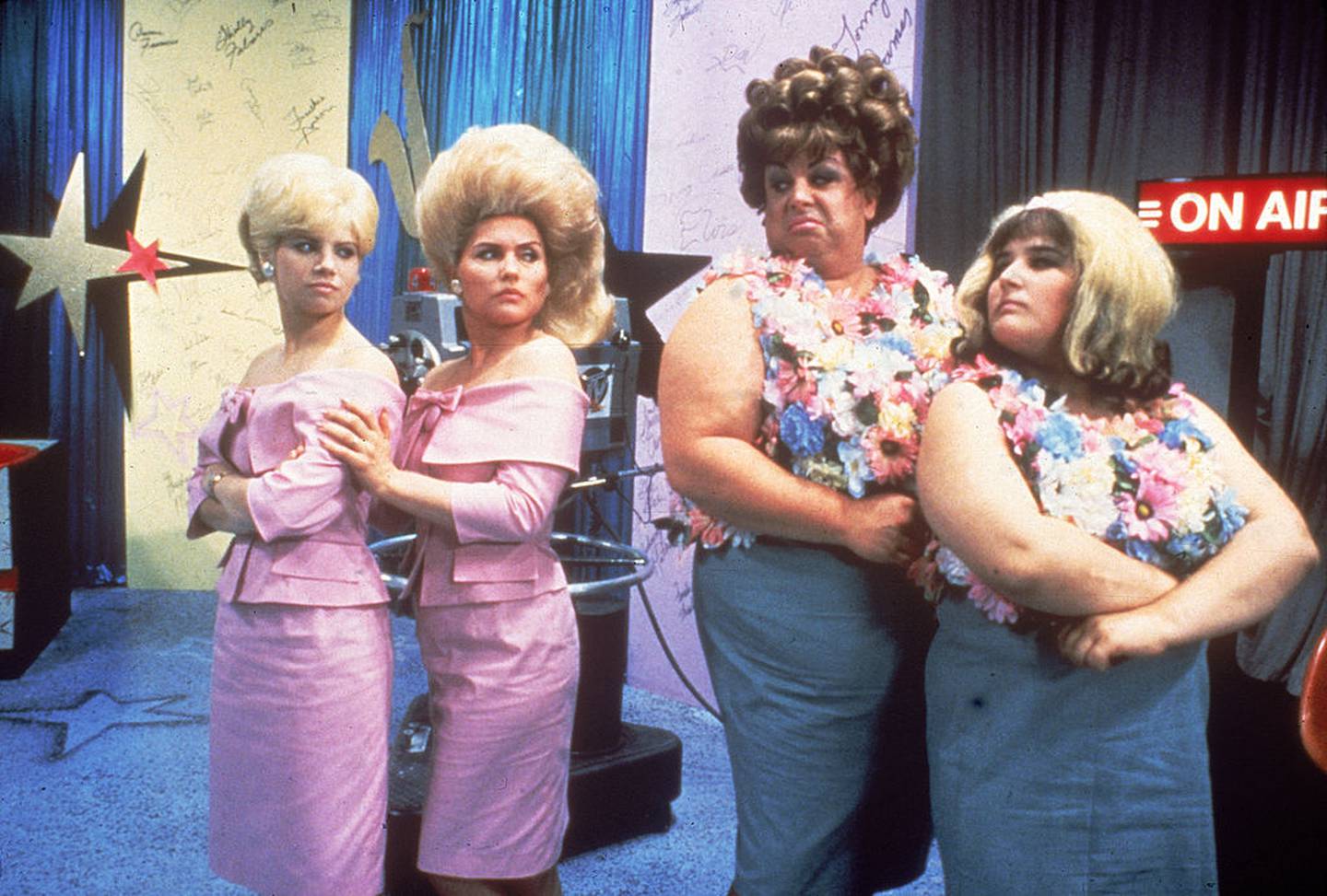 From left, American actors Colleen Fitzpatrick, Debbie Harry, Divine (1945 - 1988), and Ricki Lake in a scene from 'Hairspray,' directed by John Waters, 1988.