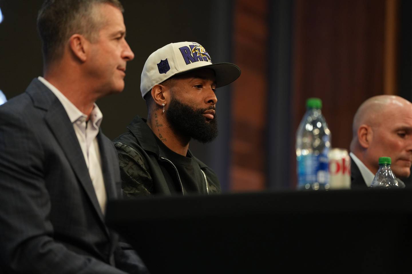 Jim Harbaugh (Left), Odell Beckham Jr. (center), Eric DeCosta (right) introduce the newest addition to the Ravens offense at the Under Armour Performance Center, on April 13, 2023.