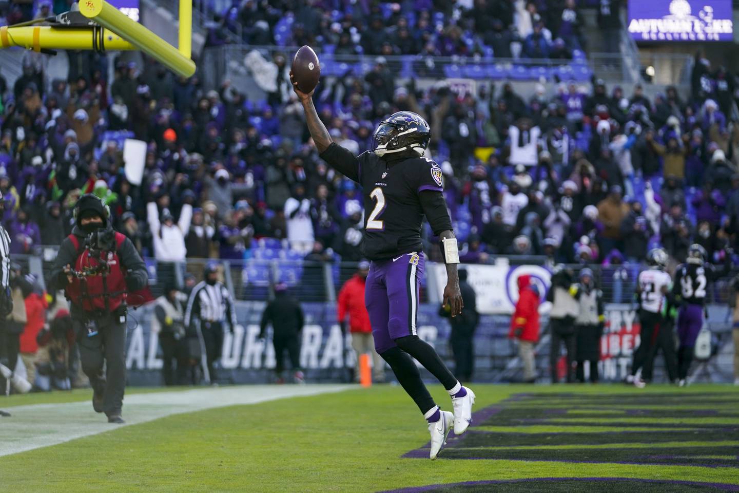 Baltimore Ravens quarterback Tyler Huntley (2) celebrates his 2-point conversion during the first half of an NFL football game against the Atlanta Falcons, Saturday, Dec. 24, 2022, in Baltimore.