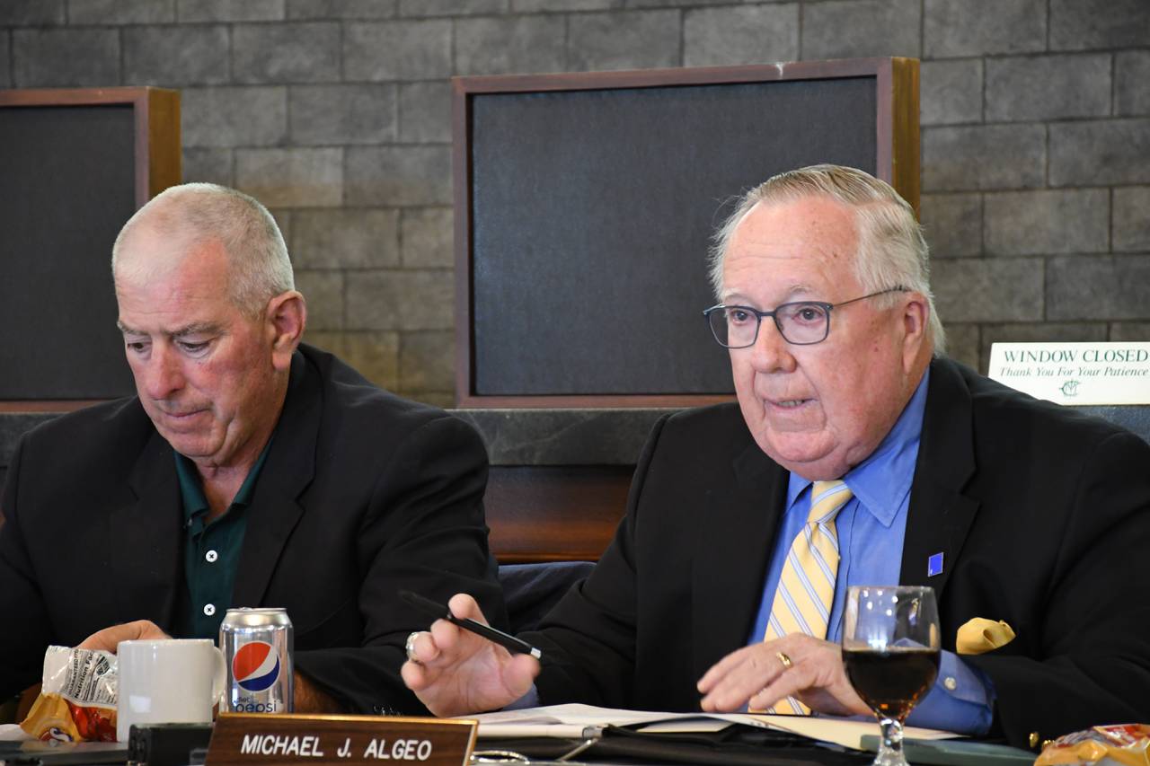 Michael Algeo, right, leads a meeting of the Maryland Racing Commission at Laurel Park on Tuesday, June 6, 2023. Seated next to him is Michael Hopkins, the commission's executive director.