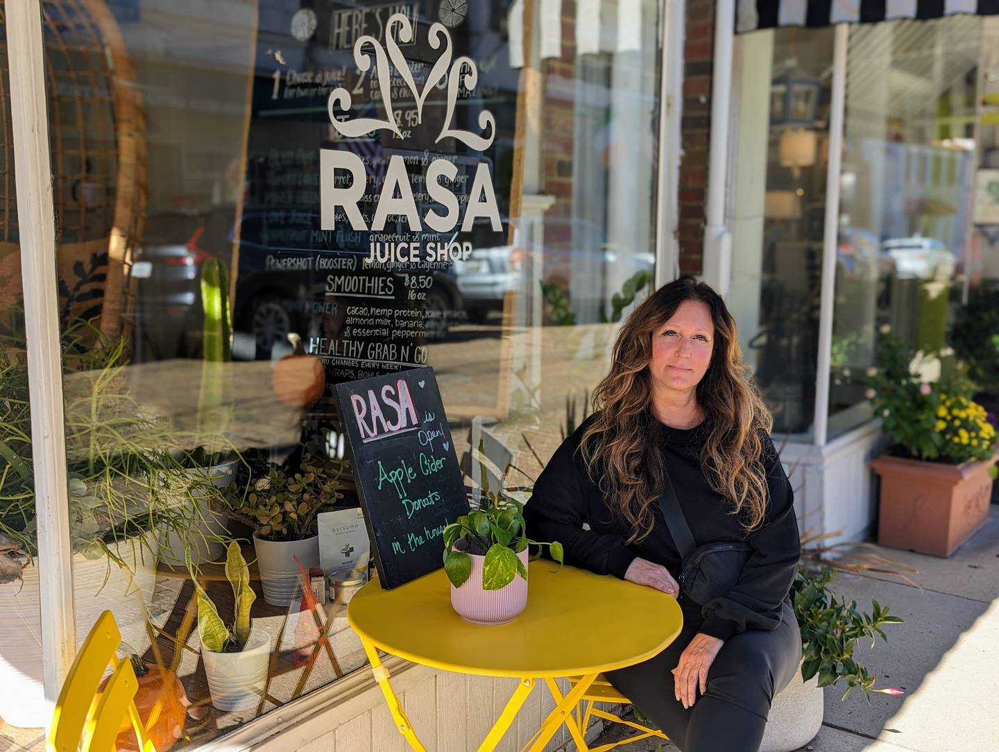 Lisa Consiglio Ryan sells juices and offers classes on wellness at her shop Rasa on Maryland Avenue in Annapolis. She can't expand because of the city interpretation of a law requiring a grease interceptor.