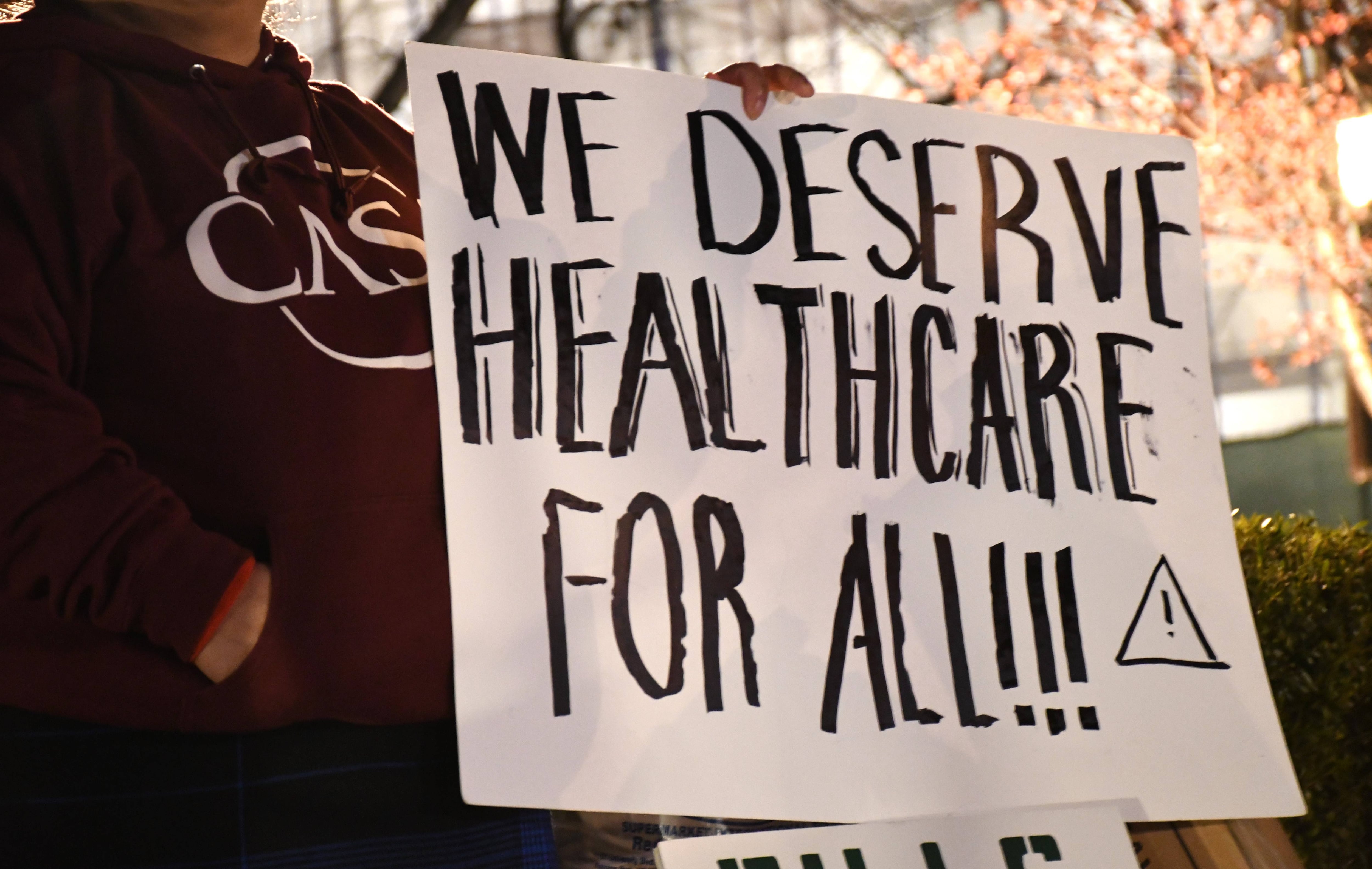 Members from several organizations held a rally on Lawyers Mall outside the State House in Annapolis on Monday, Feb. 26, 2024. They advocated for a series of bills to address health care access and affordability.