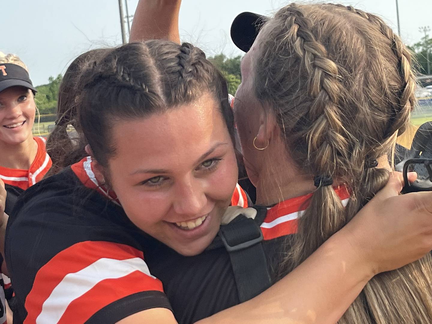 Rising Sun pitcher Cadence Williams hugs catcher Bri Cole after recording the final out in Tuesday's Class 2A state softball semifinal match with Eastern Tech. Williams and combined with senior Faith McCullough on a two-hitter as the No. 4 Tigers advanced to a second straight state final with a 7-0 decision over the 14th-ranked Mavericks at Bachmann Park in Anne Arundel County.