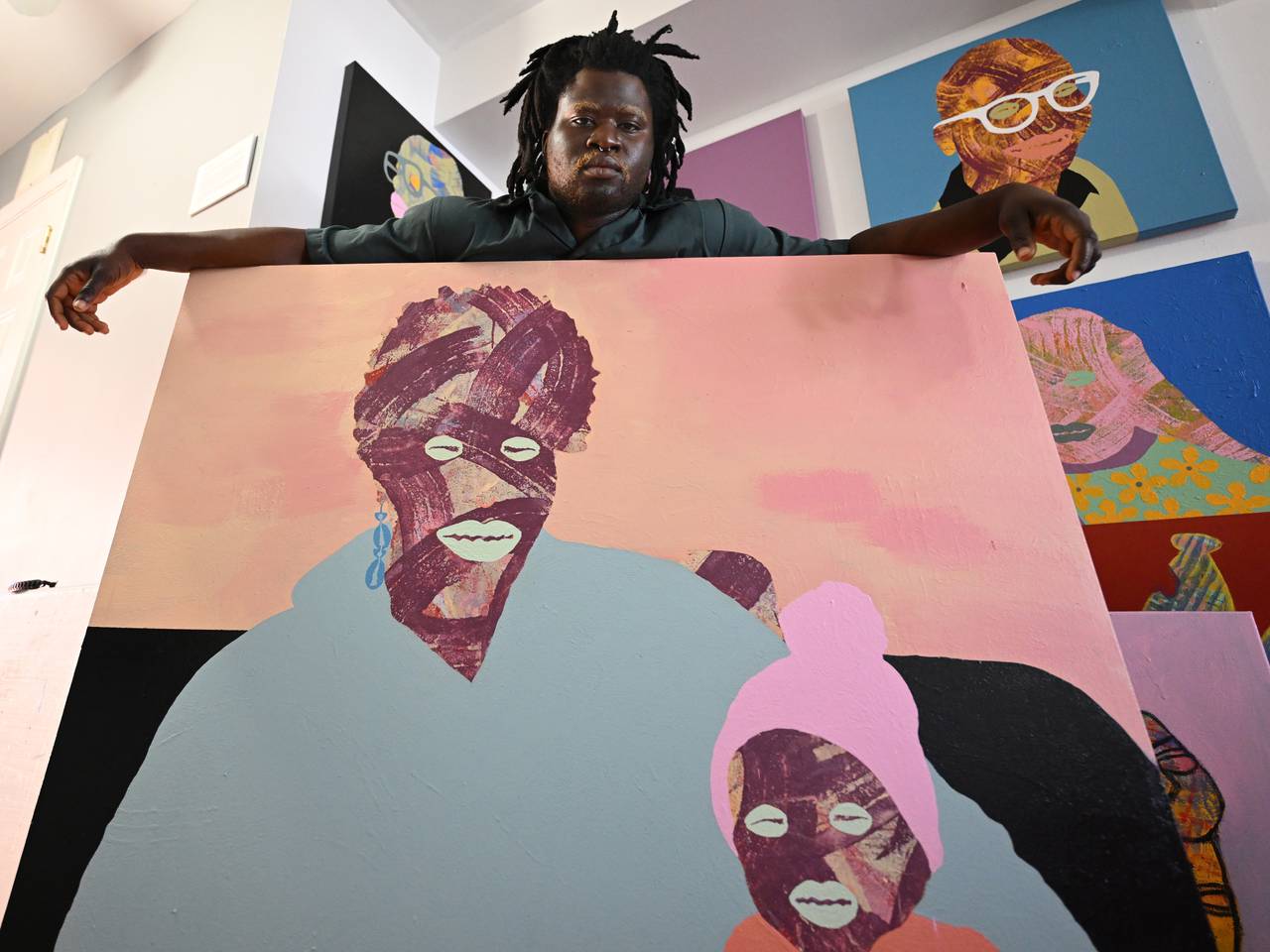 Villager poses in their studio on Sunday, Feb. 4, 2024 in Baltimore. Villager is a member of A Gente, which is an exchange between Black artists in Baltimore and Brazil that engage in deep dialogue and immerse into local culture and their art.