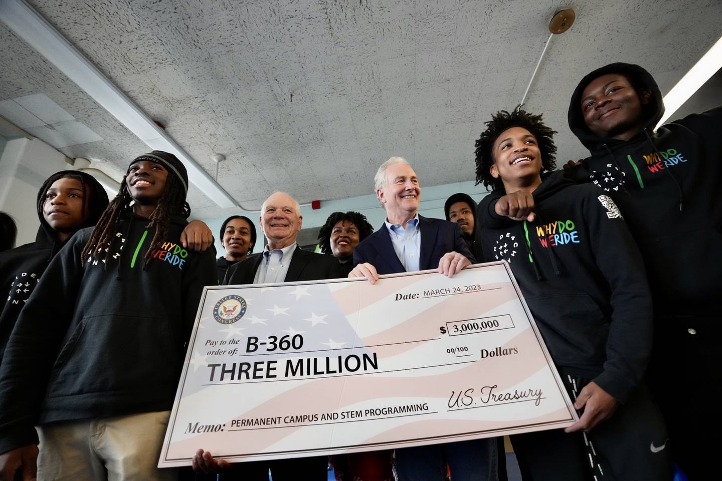 Senators Ben Cardin and Chris Van Hollen present a check for three million dollars to B-360 at a press conference to announce federal funding to build the nation’s first dirt bike campus on March 24, 2023.
