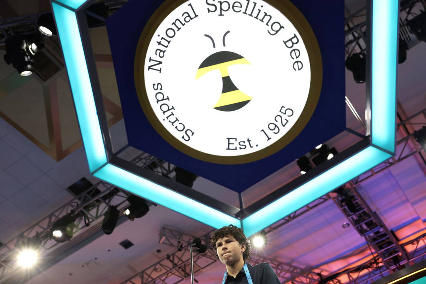 NATIONAL HARBOR, MARYLAND - MAY 30: Speller Luke Brown of Naples, Florida, participates in rounds 1 and 2 of the 2023 Scripps National Spelling Bee at Gaylord National Hotel and Convention Center on May 30, 2023 in National Harbor, Maryland. The 95th Scripps National Spelling Bee begins today through Thursday with 230 students competing for the spelling top honor.