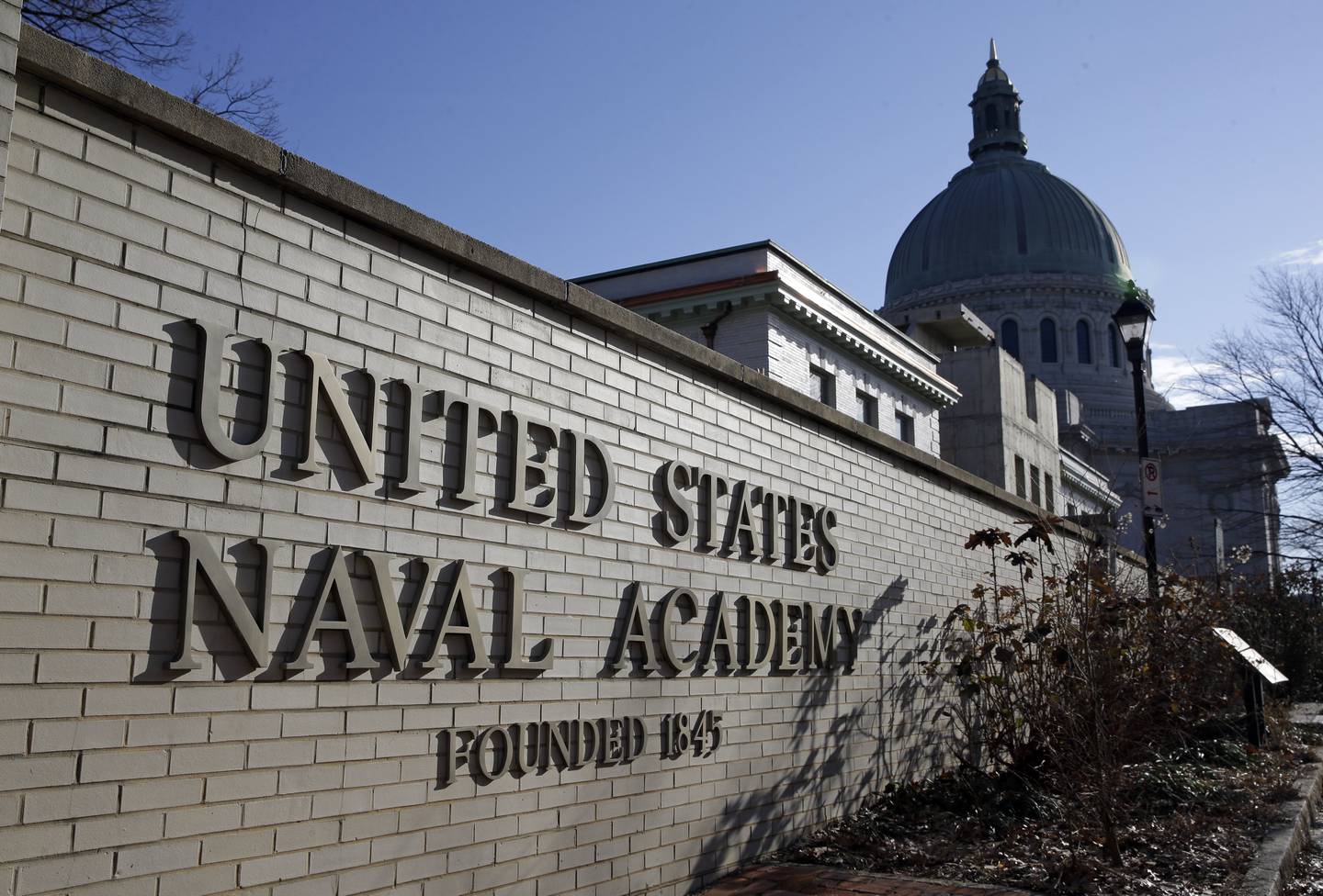 FILE - An entrance to the U.S. Naval Academy campus in Annapolis, Md., is seen Jan. 9, 2014. Reported sexual assaults at the U.S. military academies shot up during the 2021-22 school year, and one in five female students surveyed said they experienced unwanted sexual contact, the Associated Press has learned.
