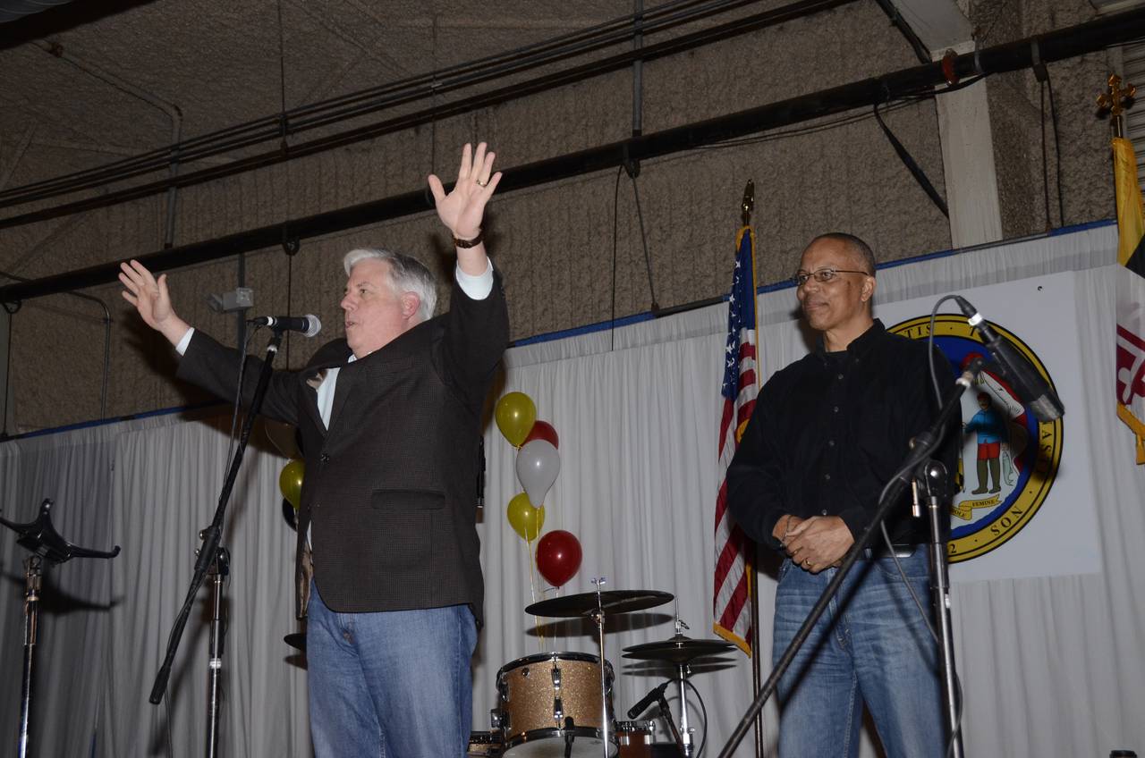 Maryland Gov. Larry Hogan, left, and Lt. Gov. Boyd Rutherford appear onstage at their "people's celebration" in Cambridge a few days after being inaugurated in 2015. The Hogan-Rutherford team also held a traditional inaugural gala in Baltimore.