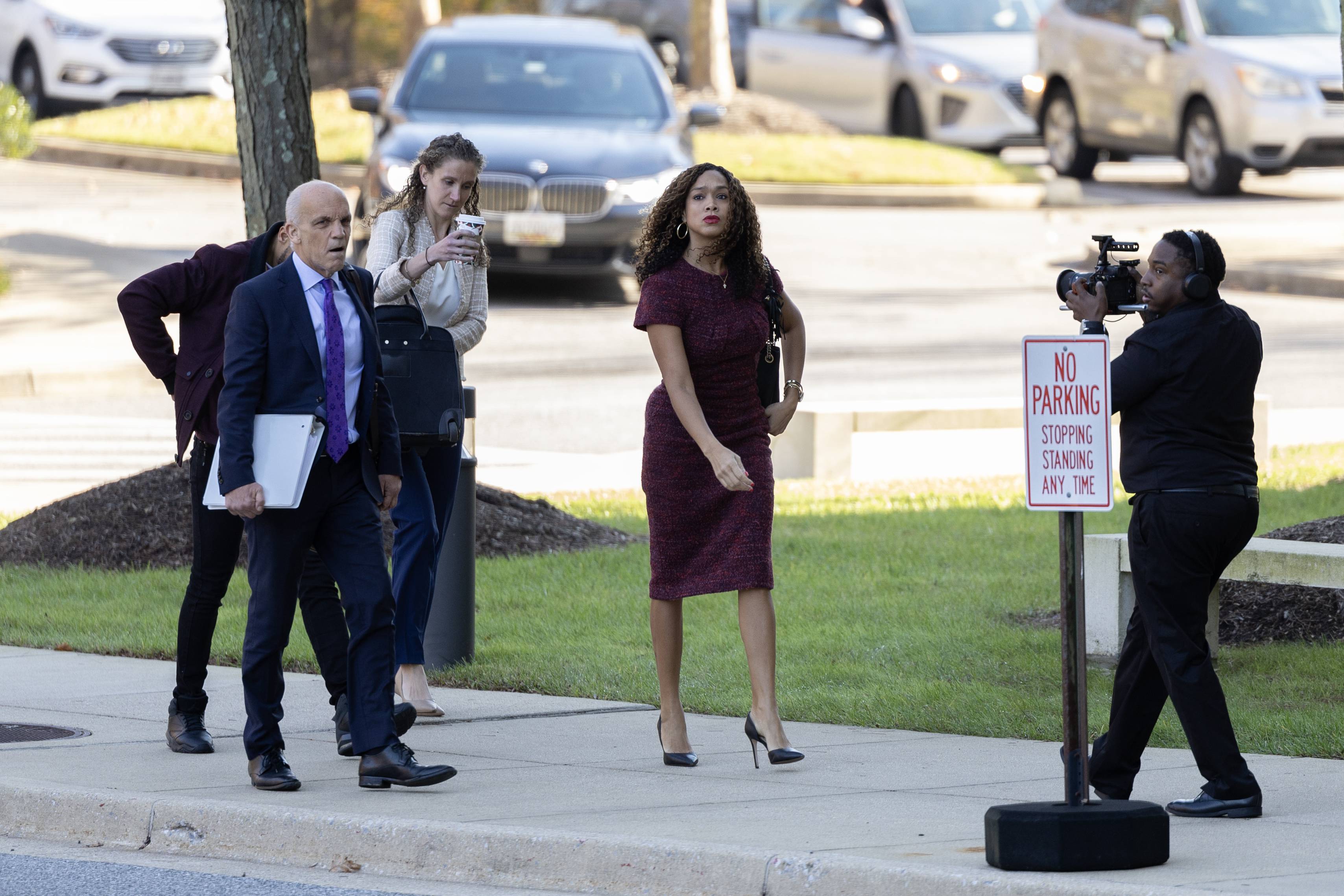 At right: Former Baltimore State’s Attorney Marilyn Mosby arrives at U.S. District Court in Greenbelt, Maryland, on Wednesday, November 8, 2023. Mosby weighed in on testifying following Tuesday’s proceedings during her federal perjury trial