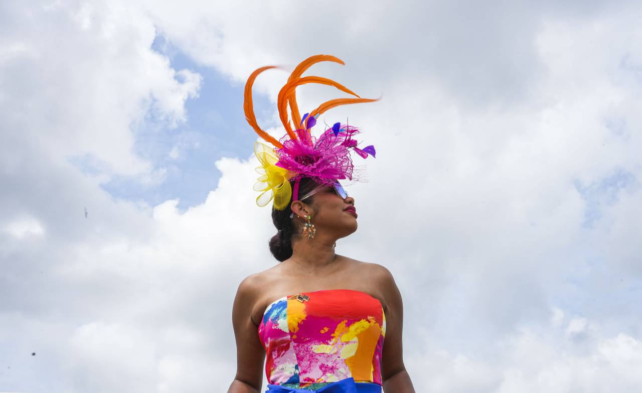 Sabrina Aloe poses for a portrait in a hate she made herself at the George E. Mitchell Black-Eyed Susan Stakes at Pimlico on May 19, 2023.