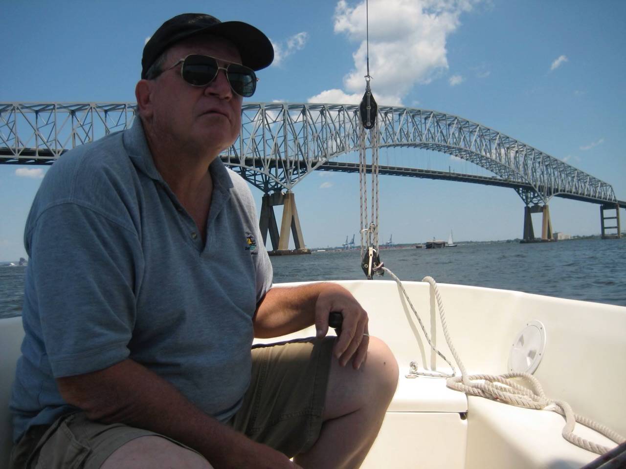 Ken Spaulding, pictured at the Key Bridge during a sail with his daughter, Stacy. The photo has become a cherished memory since her father, who taught her how to sail, died in 2016.