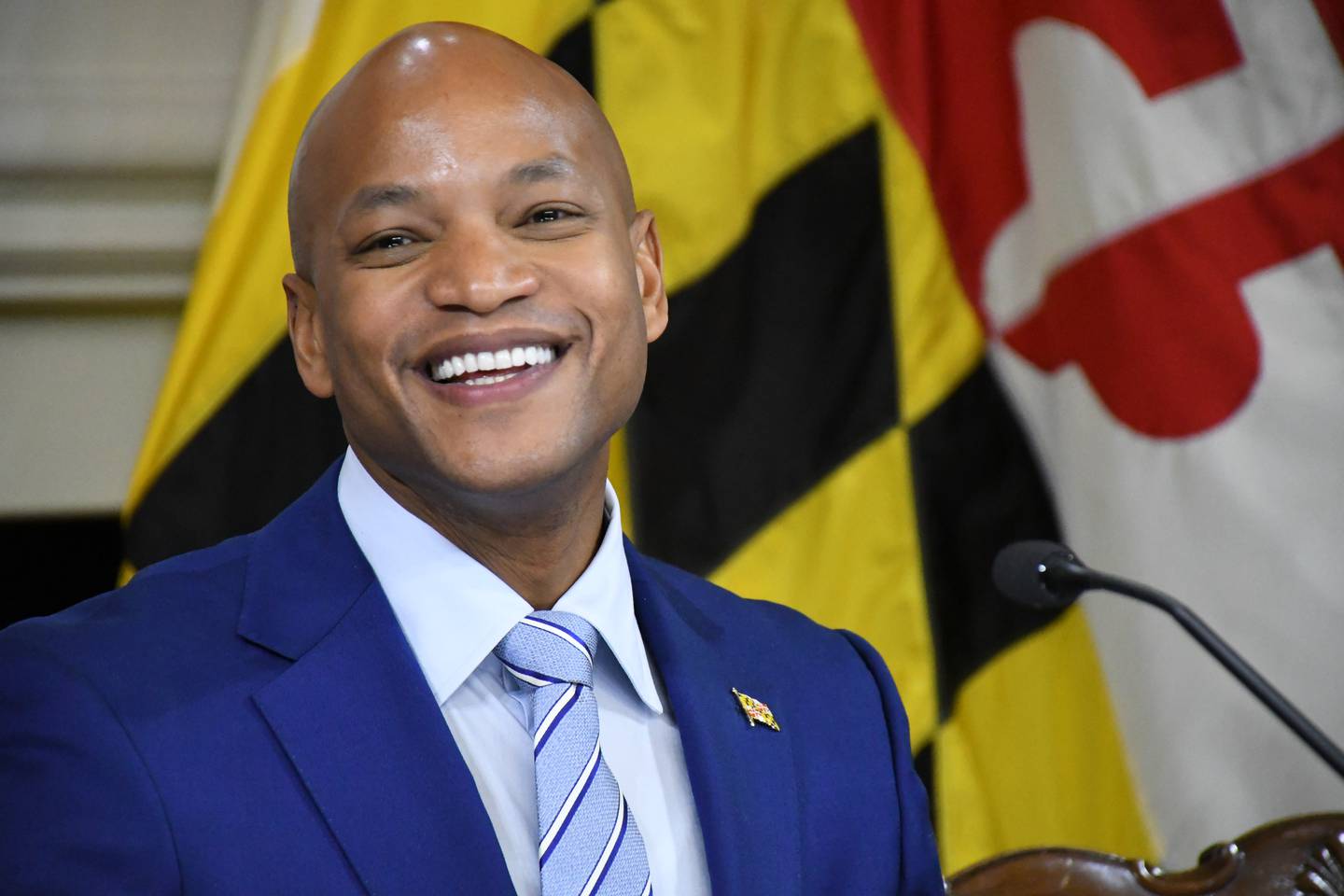 Maryland Gov. Wes Moore smiles at his first press conference at the State House in Annapolis on Thursday, Jan. 19, 2023.