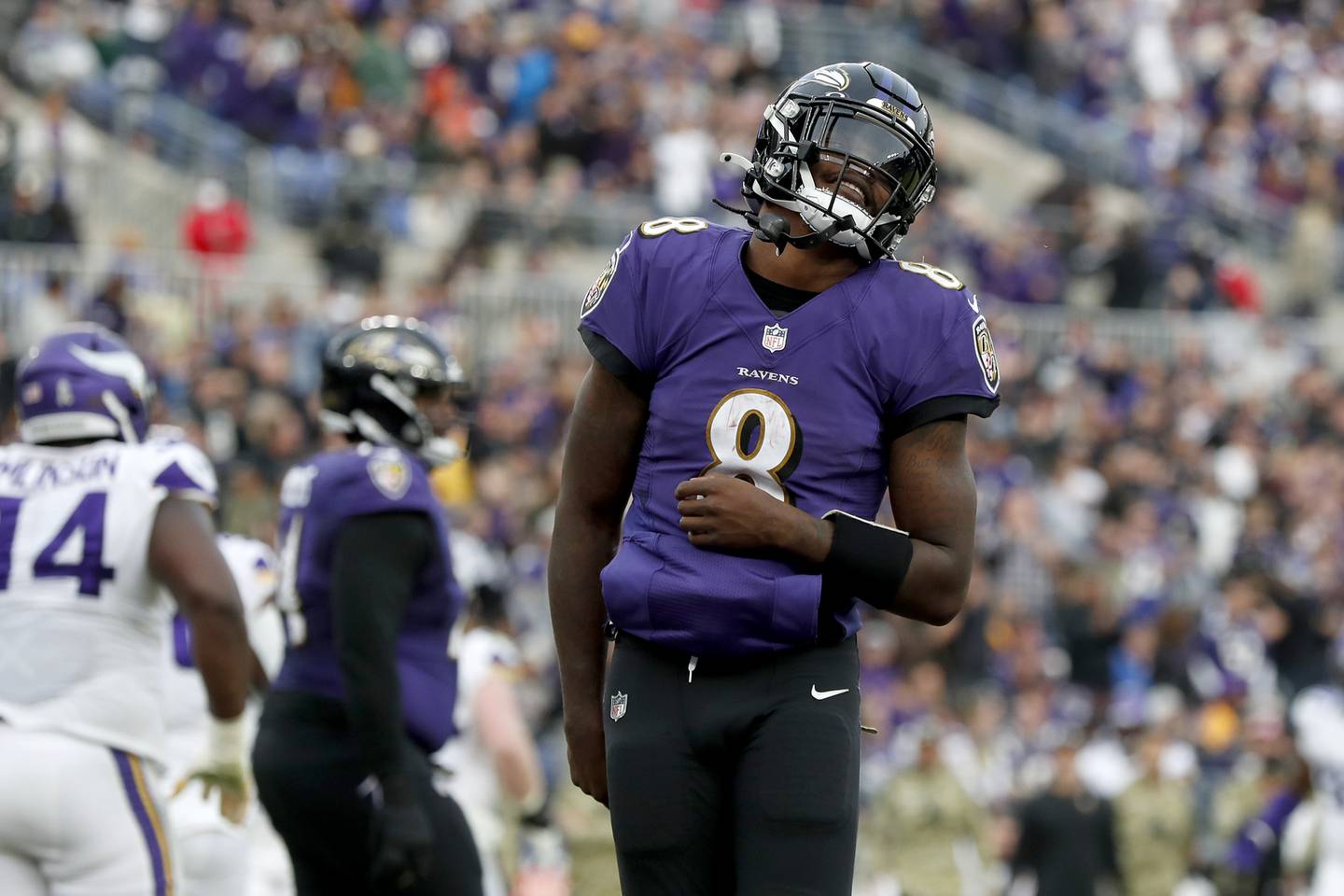 Lamar Jackson #8 of the Baltimore Ravens reacts after a fourth quarter touchdown against the Minnesota Vikings at M&T Bank Stadium on November 07, 2021 in Baltimore, Maryland.