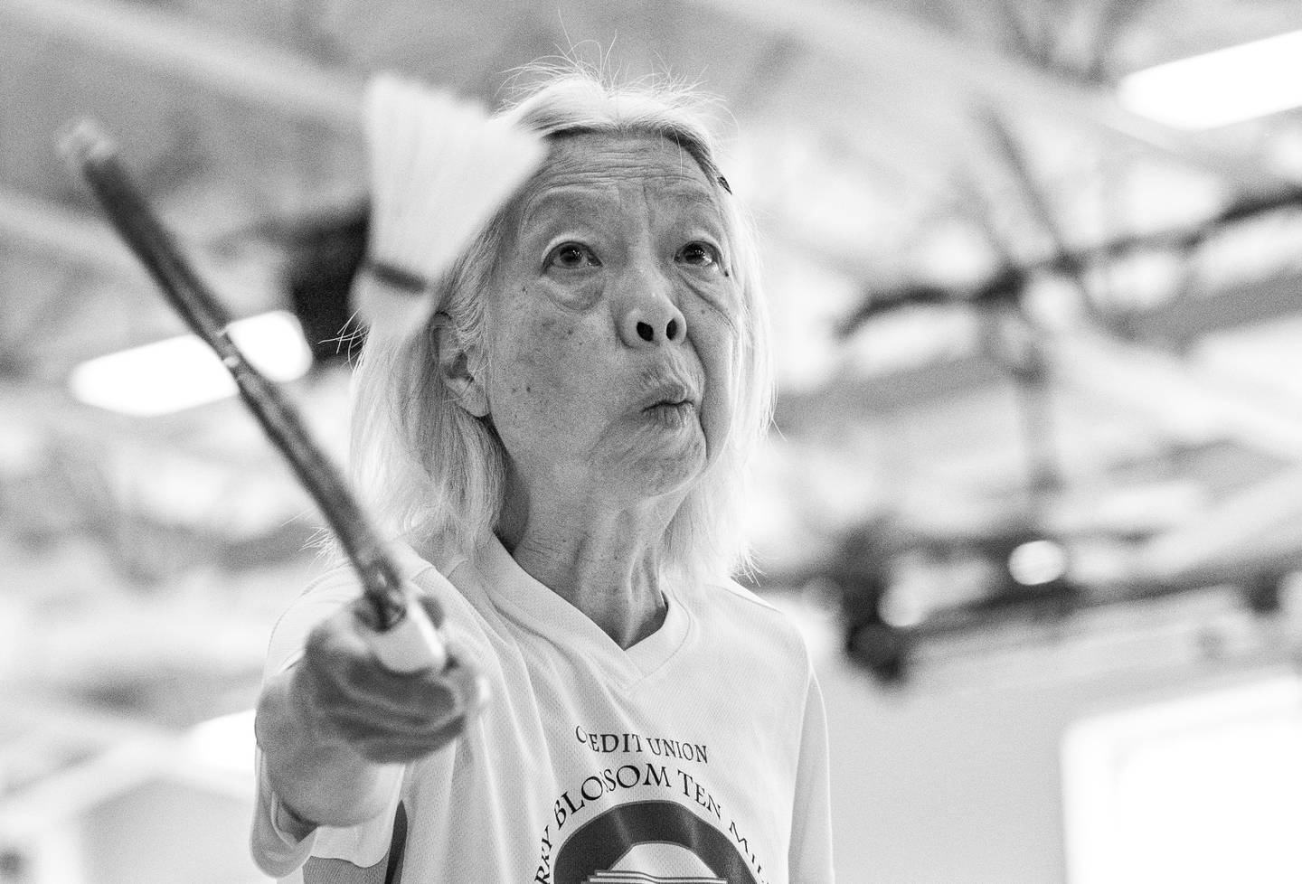 Yuen-Han Kan, 80, of Bethesda, competes in badminton at South Fayette High School, in McDonald, PA, during the National Senior Games, Wednesday, July 12, 2023.