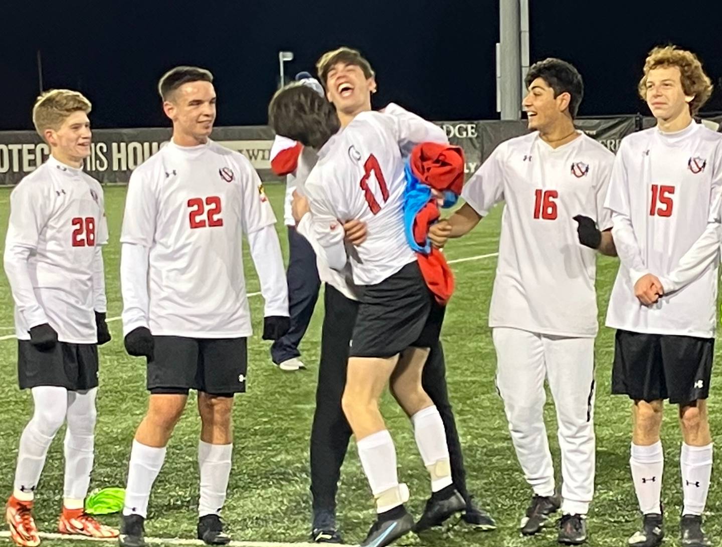 Glenelg soccer celebrates before Friday's Class 2A state championship awards cereromy. The No. 12 Gladiators captured their first title since 1997 with a 2-0 victory over 15th-ranked North Harford at Loyola University's Ridley Athletic Complex in Northwest Baltimore.