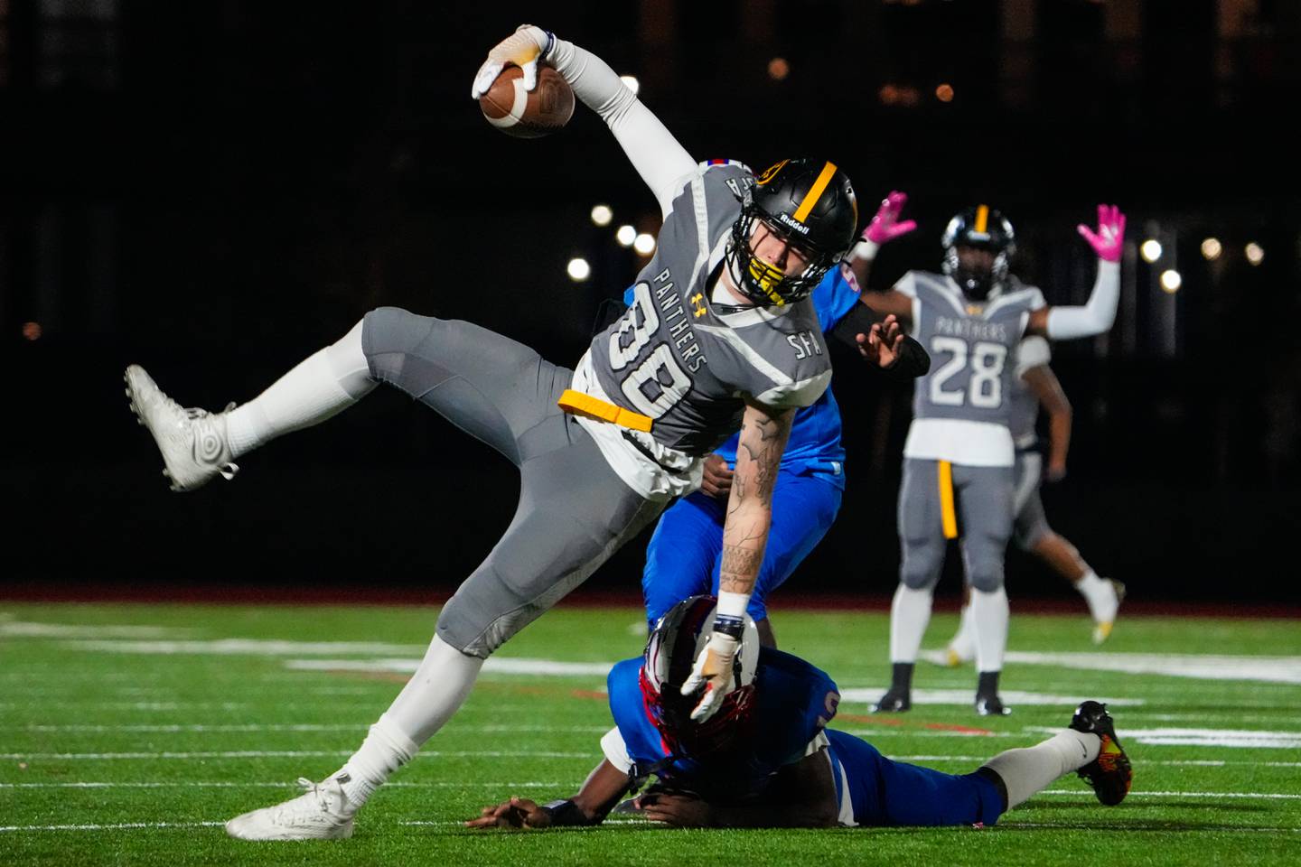 St. Frances senior tight end Chase Wilkens is tackled during the second quarter against National Christian Academy at Under Armour Stadium on Friday, Nov. 3, 2023.