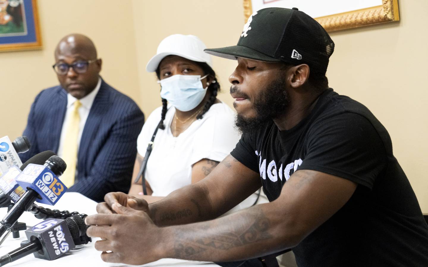 "He's my Son" say a very choked up Tavon Scott Sr. (right) with attorney J. Wyndal gordon (left) and Tonia McClain (subjects grandmother).  Scott's son os being held on a First-Degree manslaughter charge.