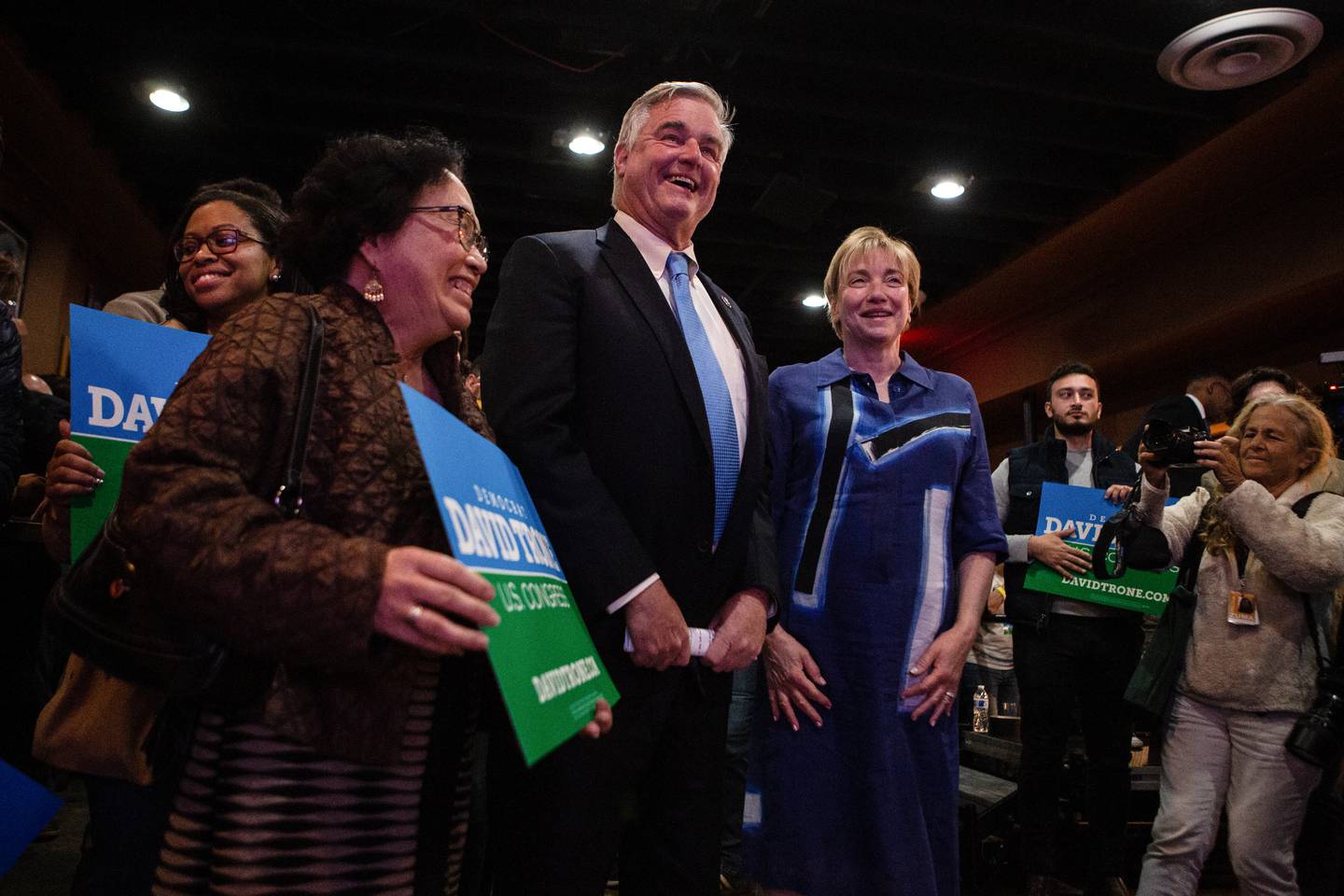 Supporters greet Congressman David Trone and his wife, June Trone (right), at his election night event at Gabriel Mt. Food Co. in Frederick on Tuesday, November 8, 2022.