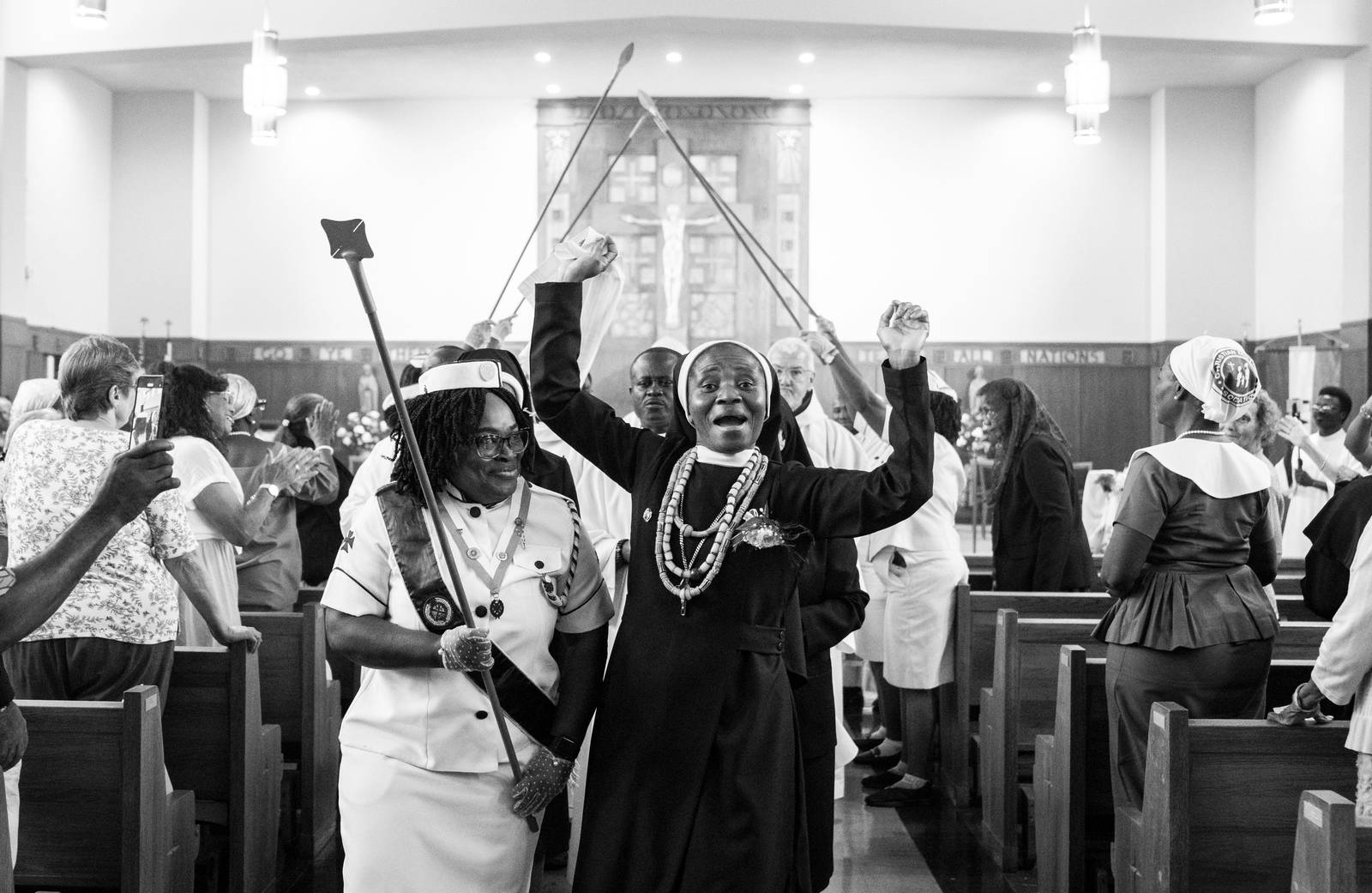 Sister Mary Pauline Tamakloe celebrates down the aisle after taking her final profession at Our Lady of Mount Providence Convent, in Arbutus, Monday, August 14, 2023.