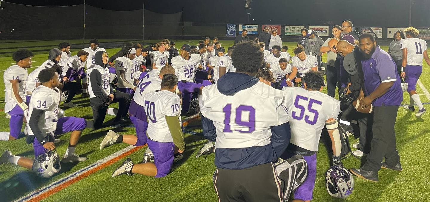 After losing at home to Chesapeake-Anne Arundel in last year's Class 3A East Region playoffs, Long Reach returned the favor Friday evening in Pasadena. The Lightning won 14-13 over the Cougars to advance to next weekend's state quarterfinals.