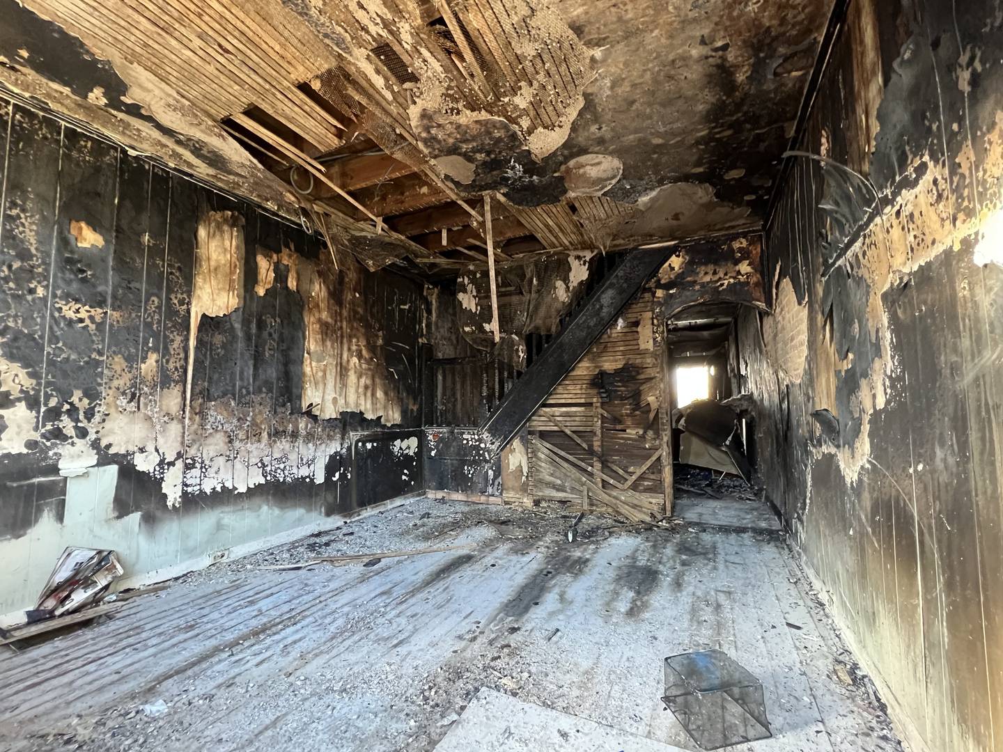 The inside of a home where a Jan. 25 fire critically injured a 58-year-old man, also hurt a woman, and killed 11 dogs. The home was owned by an ABC Capital investor who is among the scores who say they were ripped off, and highlights another wrinkle of the company's business, a loan company called Wall Street Wealth Management.