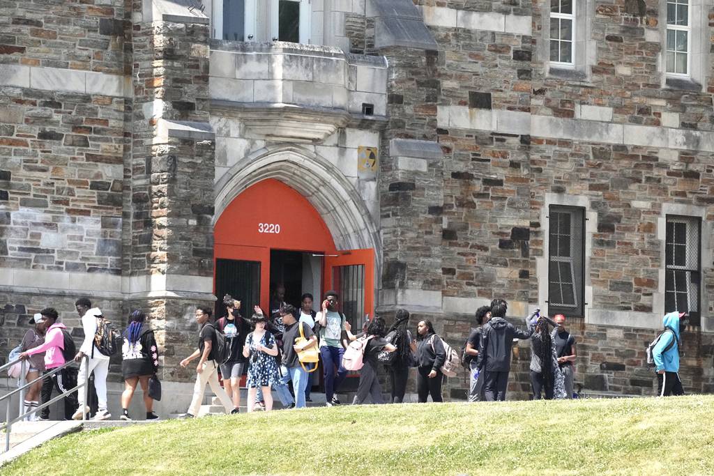 Students are dismissed early from school at Baltimore City College on June 2, 2023 because of lack of AC and rising temperatures inside the school building.
