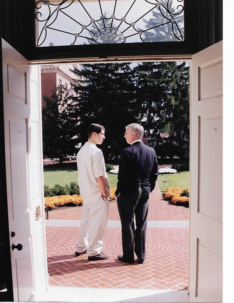Raymond Glendening talks to his father, Gov. Parris Glendening, outside the entrance to Government House in Annapolis. Raymond was at Dematha High School when his father was elected in 1994.