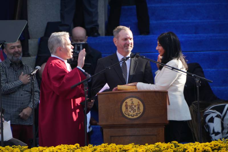 Aruna Miller is sworn in as Lt Gov. Gov. Wes Moore arrives at the podium to be sworn into office by Chief Justice Matthew Fader during his inauguration as the First African-American governor for the State of Maryland, at the Maryland State House, in Annapolis, MD, Wednesday, January 18, 2023.