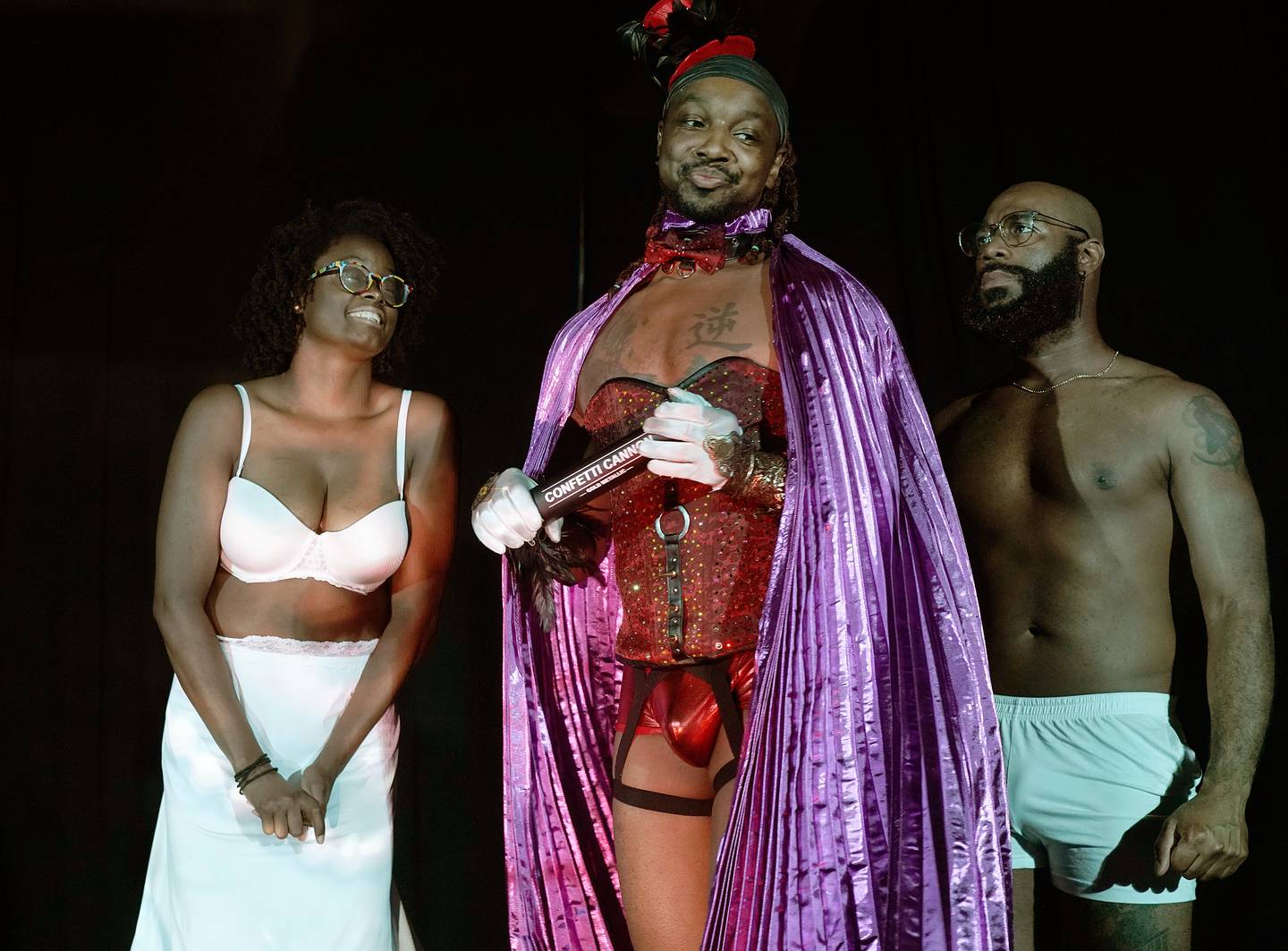 JUNE 14,2022—An all Black and queer rendition of the cult classic film Rocky Horror Freak Show Noir at the Zion Lutheran Church on the City of Baltimore.  (L to r) Actors Teresa McLorn (Janet Weiss) Ta’Von Vinson (Frank N. Furter) and Chris Reed (Brad Majors) perform.